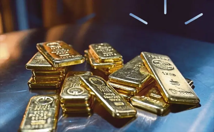 Gold Slides as Dollar Strengthens on Hawkish Fed Bets